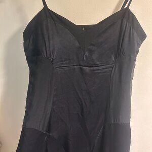 Vintage whimsy goth style black silky slip midi dress with ruffle at the bottom